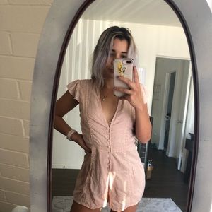 Pink polka dot romper by Amuse Society.